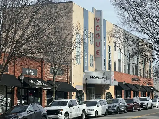Historic brick storefronts and the Vogue Theater marquee in downtown Lee's Summit, Missouri