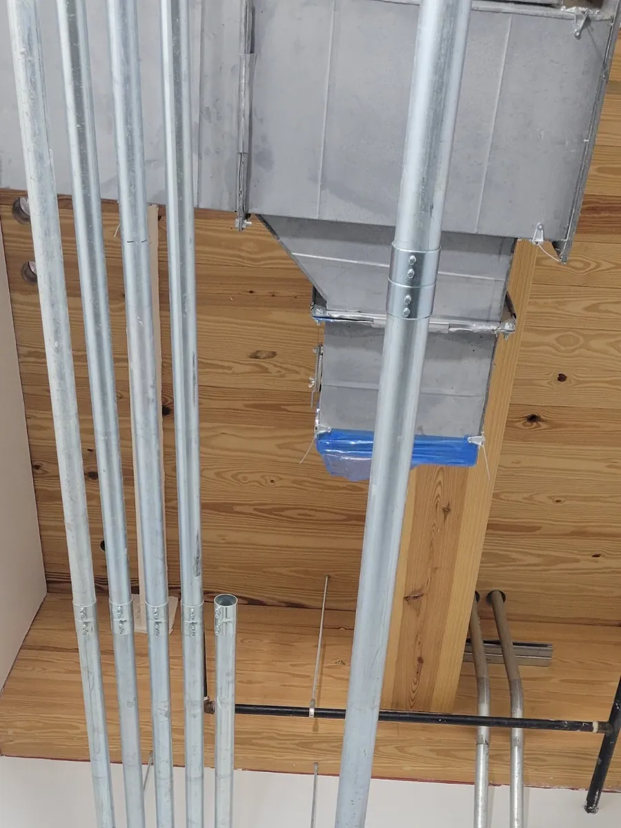 Commercial Conduit Runs Under an Exposed Ceiling