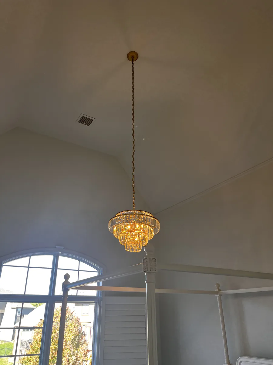 Crystal Chandelier Under a Vaulted Ceiling